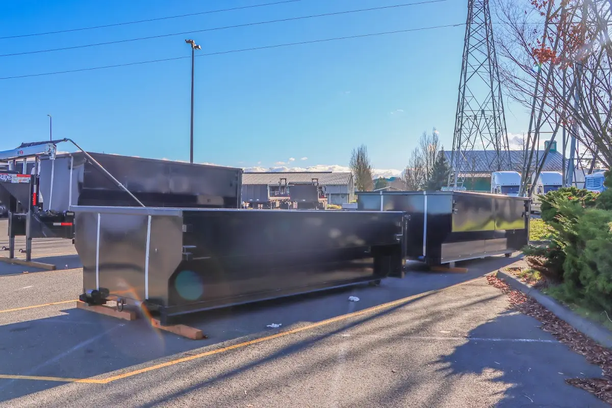 Roll-off dumpster ready for waste disposal at job site for Roofing Dumpster Rental in Clarkdale